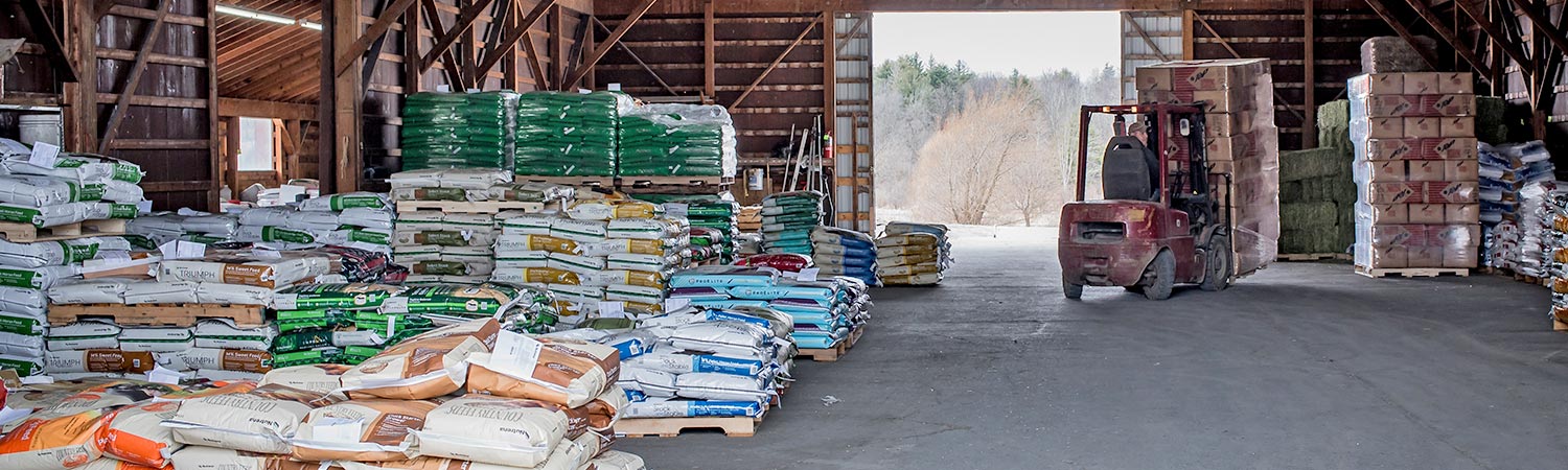 Walker's Farm feed pallets and skid loader